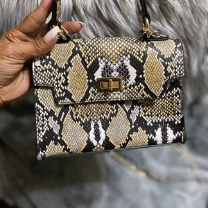 Snake skin satchel bag